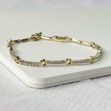 Load image into Gallery viewer, Gold Necklace with hearts and rhinestones.
