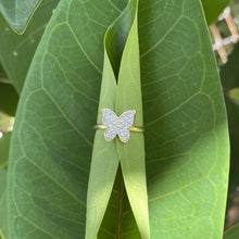 Load image into Gallery viewer, Rhinestone butterfly ring on a leaf.