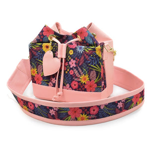 pink artisanal purse with flower design.